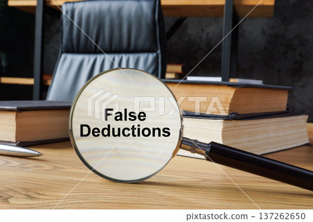 False deductions phrase as concept of tax fraud. False deductions phrase as concept of tax fraud. 137262650