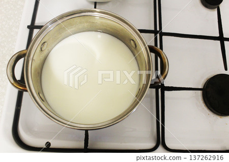 Preparation of milk soup. Top view. Preparation of milk soup. Top view. 137262916