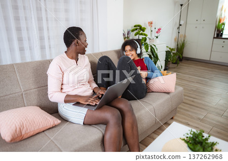 Happy family enjoying time together at home 137262968