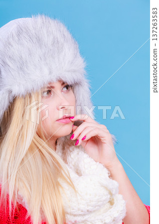 Blonde woman in winter furry hat Blonde woman in winter furry hat 137263583