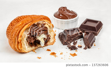 Chocolate Filled Croissant with Dark Chocolate Pieces and Cream 137263606