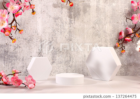 Empty beautiful spring podium with pink sakura flowers background and template for your creative product display stand and summer party concept. Elegant sunny colorful banner Empty beautiful spring podium with pink sakura flowers background and template for your creative product display stand and summer party concept. Elegant sunny colorful banner 137264475