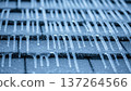 Frozen Metal Grid with Icicles Forming. 137264566