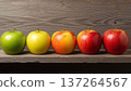 Five Apples in Different Colors on Wood. 137264567