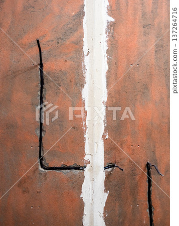 wall covered with primer with sealed seam 137264716