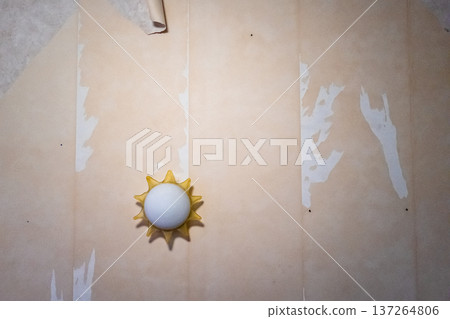 lamp on wall stripped of wallpaper lamp on wall stripped of wallpaper 137264806