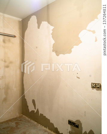 plastered wall of room with peeling wallpaper plastered wall of room with peeling wallpaper 137264811