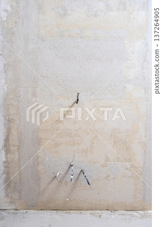 plastered wall with exposed electrical wires plastered wall with exposed electrical wires 137264905