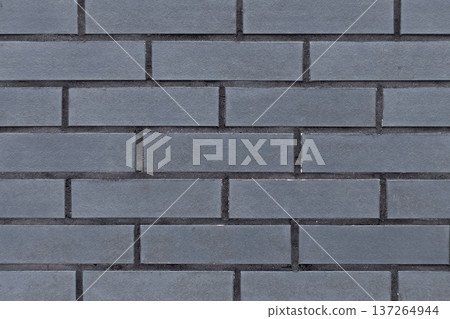 Seamless grey brick wall imitation texture, modern construction material background Seamless grey brick wall imitation texture, modern construction material background 137264944