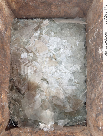 Broken glass from industrial waste produced during the demolition of a house Broken glass from industrial waste produced during the demolition of a house 137265473
