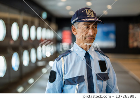 Security guard, guard, senior man Security guard, guard, senior man 137265995