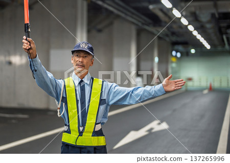 Security guard, traffic control officer, senior man Security guard, traffic control officer, senior man 137265996