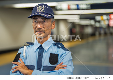 Security guard senior male airport 137266007