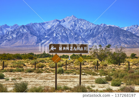 Manzanar Sign With Eastern Sierra Mountains And Arid California Landscape Manzanar Sign With Eastern Sierra Mountains And Arid California Landscape 137268197