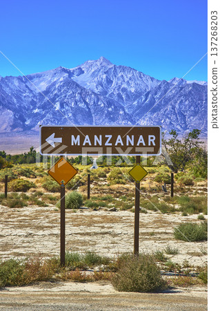 Manzanar Directional Sign with Eastern Sierra Mountain Landscape California Manzanar Directional Sign with Eastern Sierra Mountain Landscape California 137268203
