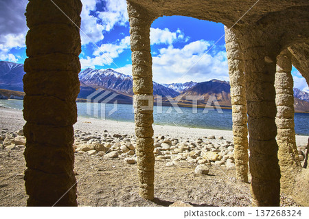 Crowley Lake Stone Columns Snowy Sierra Mountains and Blue Lake Shoreline Crowley Lake Stone Columns Snowy Sierra Mountains and Blue Lake Shoreline 137268324