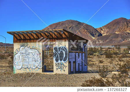 Abandoned Graffiti Covered Building Desert Landscape and Mountains Yermo California Abandoned Graffiti Covered Building Desert Landscape and Mountains Yermo California 137268327