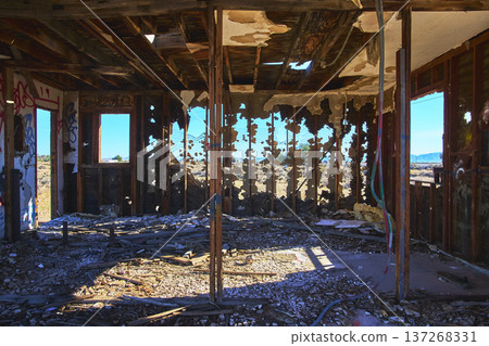 Abandoned Desert House Interior with Graffiti and Sunlight in Ruins 137268331