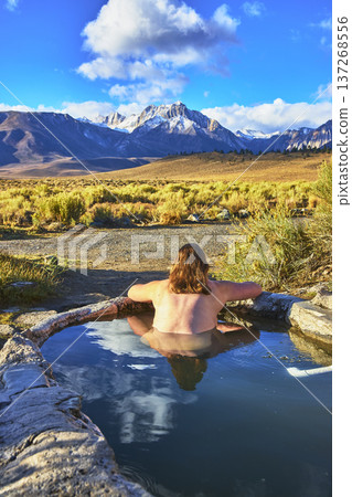 Hot Spring Relaxation With Snowy Sierra Mountains And Blue Sky In California Hot Spring Relaxation With Snowy Sierra Mountains And Blue Sky In California 137268556