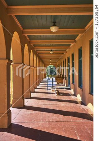 Spanish Style Archway Corridor with Sunlight and Shadows at Kelso Visitors Center 137268564