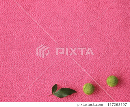 Red crepe background: Nandina leaves and crepe balls Red crepe background: Nandina leaves and crepe balls 137268597