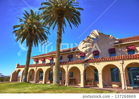 Kelso Visitors Center Palm Trees and Spanish Revival Architecture in Bright Mojave Sun 137268669