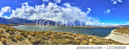 Panorama Crowley Lake and Eastern Sierra Mountains with Dramatic Sky and Desert Foreground 137268680