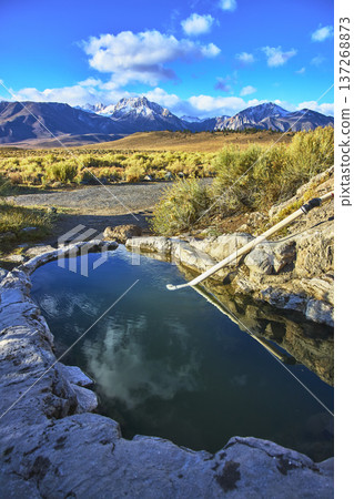 Rock Tub Hot Springs With Snow Capped Mountain And Sagebrush In Eastern Sierra California 137268873