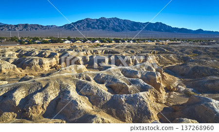 Aerial Rugged Desert Landscape Suburban Homes and Mountains Near Las Vegas Nevada 137268960