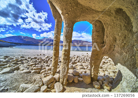 Crowley Lake Stone Columns with Sierra Mountains and Lake under Bright Blue Sky Crowley Lake Stone Columns with Sierra Mountains and Lake under Bright Blue Sky 137269056