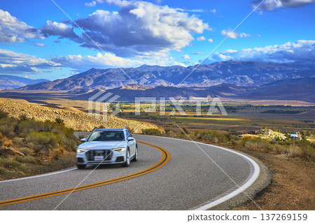 Mountain Road Car and Scenic Valley Landscape Eastern Sierra California Mountain Road Car and Scenic Valley Landscape Eastern Sierra California 137269159
