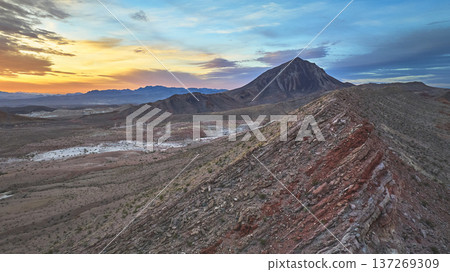 Aerial Lava Butte Sunrise Over Rugged Mountain Landscape Nevada Desert Aerial Lava Butte Sunrise Over Rugged Mountain Landscape Nevada Desert 137269309