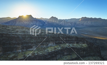 Aerial Golden Hour Over Cowboy Canyon and Red Rock Mountain Range Nevada Aerial Golden Hour Over Cowboy Canyon and Red Rock Mountain Range Nevada 137269321