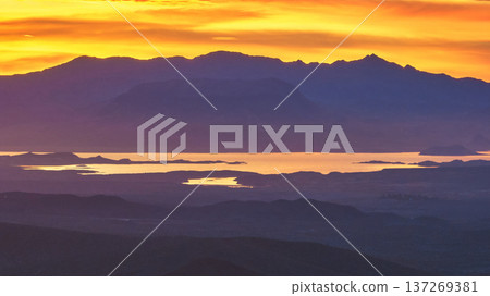 Aerial Sunrise Over Nevada Desert Mountains and Reflective Water Golden Hour Aerial Sunrise Over Nevada Desert Mountains and Reflective Water Golden Hour 137269381