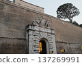 Vatican Museums entrance portal with coat of arms and stone arch Rome Italy. High quality photo 137269991