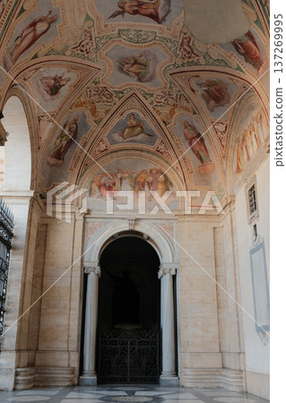 Archbasilica of Saint John Lateran Rome exterior facade and grand baroque interior with golden coffered ceiling vast nave marble statues side chapels ornate altar apse and dome Catholic basilica Archbasilica of Saint John Lateran Rome exterior facade and grand baroque interior with golden coffered ceiling vast nave marble statues side chapels ornate altar apse and dome Catholic basilica 137269995