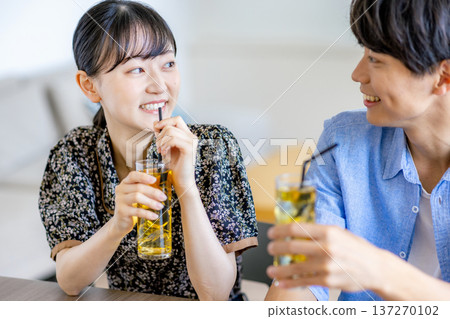 A man and a woman in a cafe A man and a woman in a cafe 137270102