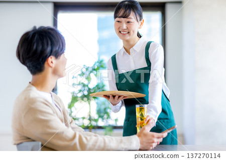 Female part-time worker at cafe 137270114