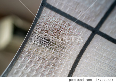 Torn room air conditioner filter Torn room air conditioner filter 137270283