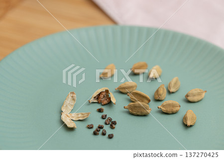 Cardamom seeds - spice stock photo - Cardamom is said to be good for preventing hay fever Cardamom seeds - spice stock photo - Cardamom is said to be good for preventing hay fever 137270425