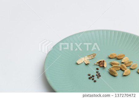 Cardamom seeds - spice stock photo - Cardamom is said to be good for preventing hay fever Cardamom seeds - spice stock photo - Cardamom is said to be good for preventing hay fever 137270472