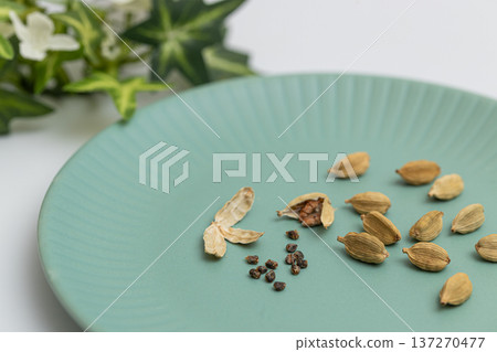 Cardamom seeds - spice stock photo - Cardamom is said to be good for preventing hay fever Cardamom seeds - spice stock photo - Cardamom is said to be good for preventing hay fever 137270477