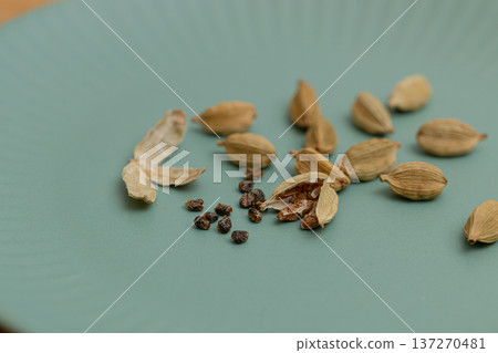 Cardamom seeds - spice stock photo - Cardamom is said to be good for preventing hay fever Cardamom seeds - spice stock photo - Cardamom is said to be good for preventing hay fever 137270481