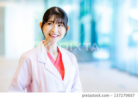 Young female doctor working in a hospital Young female doctor working in a hospital 137270687
