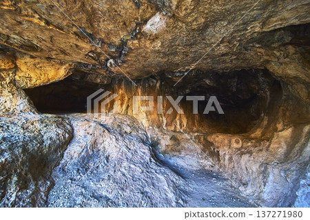 Peekaboo Canyon Desert Cave Interior With Rugged Rock Formations And Textures Peekaboo Canyon Desert Cave Interior With Rugged Rock Formations And Textures 137271980