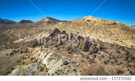 Aerial Nevada Desert Mountains Rocky Outcrops and Sparse Vegetation Aerial Nevada Desert Mountains Rocky Outcrops and Sparse Vegetation 137272082