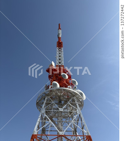 Radio tower that shines in the blue sky Radio tower that shines in the blue sky 137272442