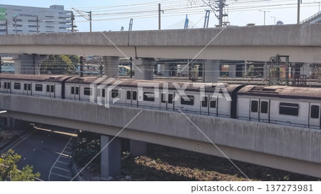 Lai King MTR Train Travels Along Elevated Railway Feb 16 2026 137273981
