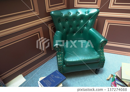 July 4 2025 Green Leather Armchair in Classic Study with Books Around 137274088
