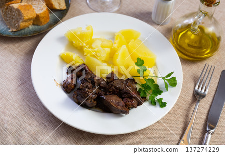 Dish made with chicken liver, heart, and potatoes Dish made with chicken liver, heart, and potatoes 137274229